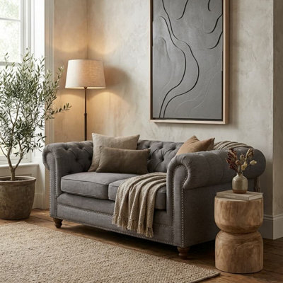Orsina Two Seat Grey Linen SofaButton Tufted Chesterfield Back And Scrolled ArmsPlush Upholstered Seat from B&Q