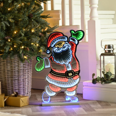 Festive Infinity Standing Santa With Wooden Base60Cm from B&Q