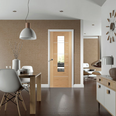 Xl Joinery Internal Portici Oak Clear Glass Pre-Finished Door 1981 X 686 X 35mm (27") from B&Q