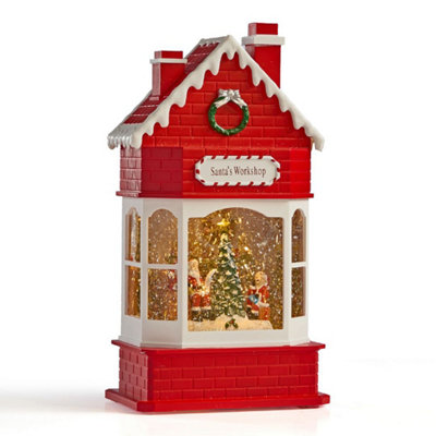 The Christmas Workshop Santa's Workshop Snow Globe from B&Q