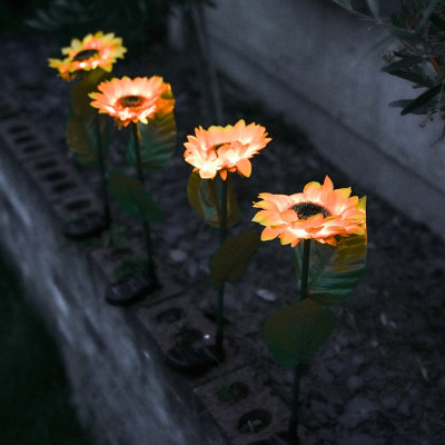 Gardenwize Pack Of 4 Solar Powered Sunflower Stake Lights Garden Pathway Walkway Lighting from B&Q