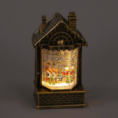 Snowtime Santa And Reindeers Christmas Water House Light Up Snow Globe Decoration20Cm from B&Q
