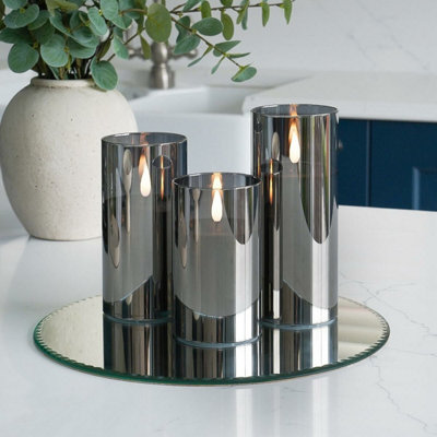 Festive Lights Ember™ Battery Hurricane Smoked-Glass CandleTrio from B&Q