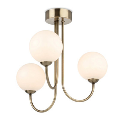 Luminosa Lighting Luminosa Lyndon 3 Light Globe Flush Fitting Antique Brass With Opal White Glass from B&Q