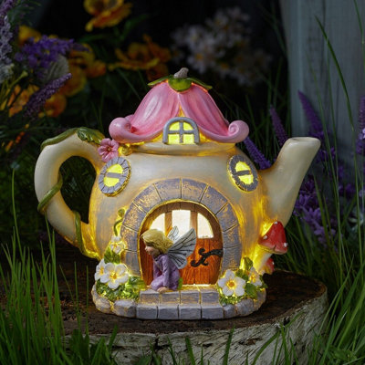 Solar Powered Teapot Shaped Fairy HouseWeatherproof Hand Painted Home Garden Novelty Ornament With 2 Led Lighting Effects from B&Q