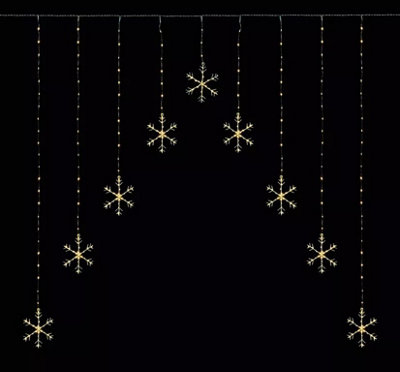Premier Decorations Limited Christmas Curtain Lights 339 Led Snowflake Mains 1.2 X 1.2M Warm White from B&Q