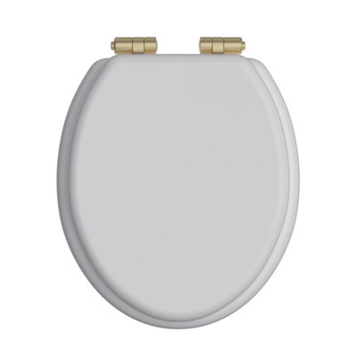 Heritage Soft Close Toilet Seat With Brushed Brass HingesWhite Gloss from B&Q