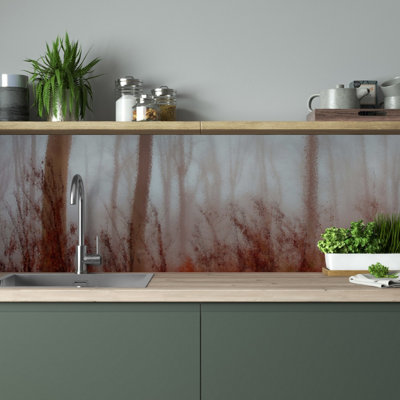 Frosted splashback featuring a serene winter forest scene with snow-covered trees.