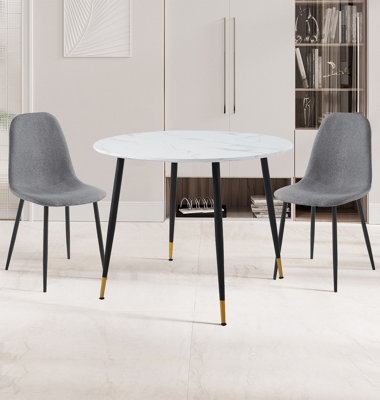Hallowood Furniture Finley Small Round Dining Table In Marble Finish With 2 Dark Grey Fabric Chairs from B&Q