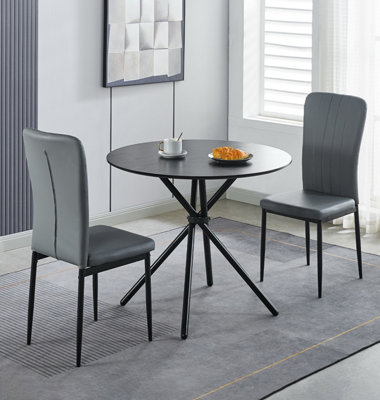 Hallowood Furniture Cullompton Small Black Round Dining Table 90Cm With 2 Light Grey Faux Leather Chairs from B&Q
