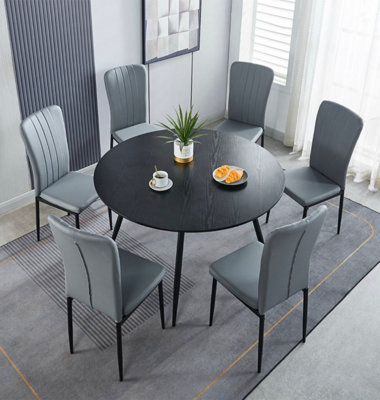 B&Q -  Cullompton Large Black Round Dining Table 120Cm With 6 Light Grey Faux Leather Chairs