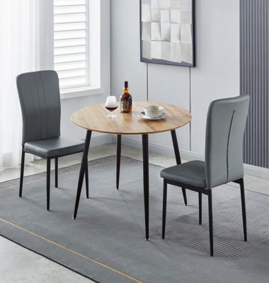 Hallowood Furniture Cullompton Small Round Dining Table 90Cm With 2 Faux Leather Grey Chairs from B&Q