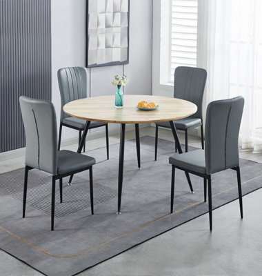Hallowood Furniture Cullompton Large Round Dining Table 120Cm With 4 Faux Leather Grey Chairs from B&Q