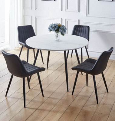 Hallowood Furniture Cullompton Large Round Dining Table (1.2M) With 4 Black Bonded Leather Chairs from B&Q