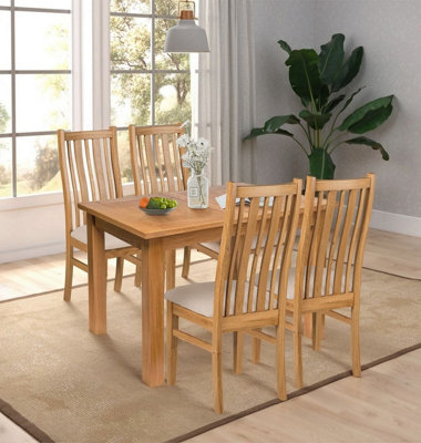 Hallowood Furniture Camberley Oak Butterfly Extending Dining Table With 4 Premium Oak Chairs With Beige Seat Pad from B&Q