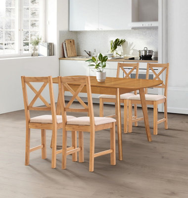Hallowood Furniture Aston Butterfly Extending Table With 4 Cross Back Oak Chairs In Beige Seat Pad from B&Q