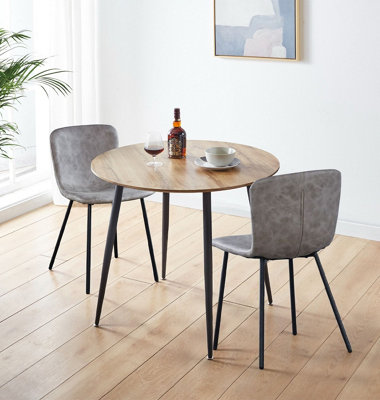 Hallowood Furniture Cullompton Round Dining Table 90Cm With 2 Taupe Faux Leather Chairs from B&Q