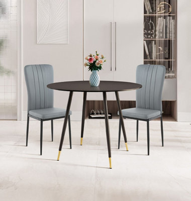 Hallowood Furniture Finley Small Round Dining Table In Black Finish With 2 Light Grey Faux Leather Chairs from B&Q