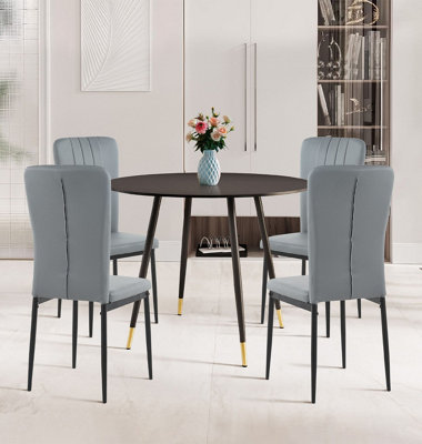 Hallowood Furniture Finley Small Round Dining Table In Black Finish With 4 Light Grey Faux Leather Chairs from B&Q