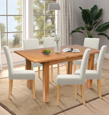Hallowood Furniture Camberley Oak Butterfly Extending Dining Table With 6 Straight Back Fabric Chairs In Beige from B&Q