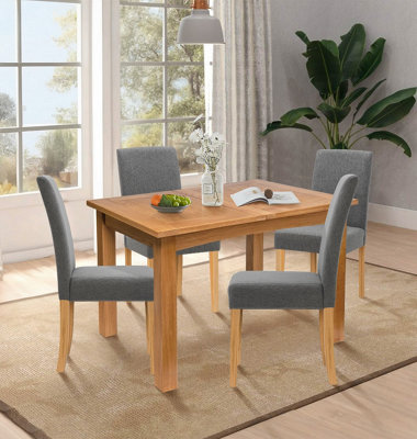 Hallowood Furniture Camberley Oak Butterfly Extending Dining Table With 4 Straight Back Fabric Chairs In Grey from B&Q