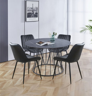 Hallowood Furniture Cullompton Large 120Cm Round Table With 4 Black Bonded Leather Dining Chairs from B&Q