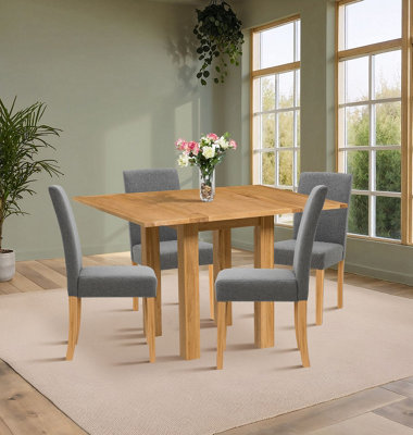 Hallowood Furniture Waverly Small Folding Table With 4 Upholstered Chairs In Grey Fabric from B&Q
