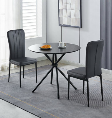 Hallowood Furniture Cullompton Dining SetSmall Round Black Dining Table 90Cm With 2 Black Faux Leather High Back Chairs from B&Q