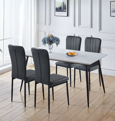 Hallowood Furniture Cullompton Large Rectangular Dining Table 160X90CmWhite Marble Effect TopWith 4 Black Faux Leather Chairs from B&Q