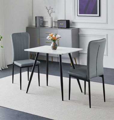 Hallowood Furniture Cullompton Small Rectangular 80Cm Dining TableWhite Marble Effect TopWith 2 Grey Faux Leather Chairs from B&Q