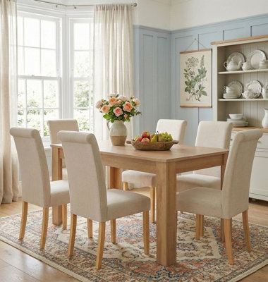 Hallowood Furniture Newquay Oak Fixed Top Table 120Cm With 6 Roll Top Cream Fabric Chairs from B&Q