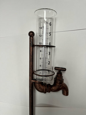 B&Q -  Rain Gauge With Decorative 'tap' Holder And Glass Rain Collector.