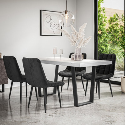 More4Homes Aria Dining Table And Chairs White Marble Effect Table Top W Black Legs + Nova Velvet Dining Chair Set Of 4 (Black) from B&Q