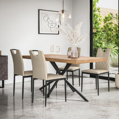 More4Homes Donni Dining Table And Chairs Oak Effect Table Top W Black Legs + Monza Faux Leather Dining Chair Set Of 6 (Beige) from B&Q