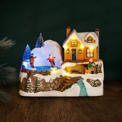 Marco Paul Musical Pre-Lit Winter Village Scene With Ice Rink from B&Q