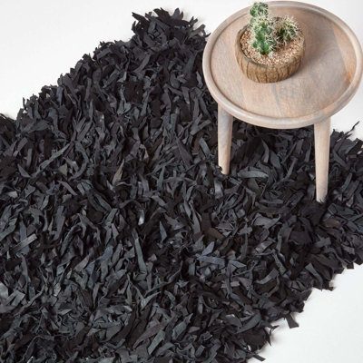 Homescapes Dallas Leather Shaggy Rug 120 X 180 Cm Black