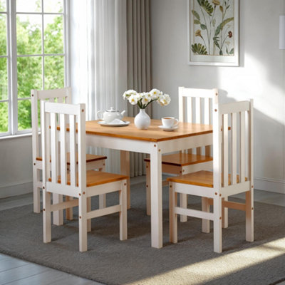 Seconique Ludlow Dining Set In Oak Effect With 4 White Chairs from B&Q