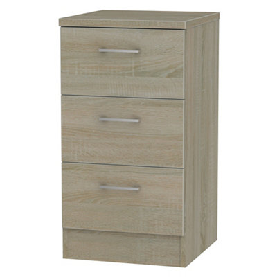Tenby Ready Assembled Dark Oak Effect 3 Drawer Bedside Table (H)695mm (W)395mm (D)415mm from B&Q