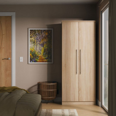 Bergamo Ready Assembled Bardolino Oak Effect Double Wardrobe (H)1824mm (W)738mm (D)530mm from B&Q