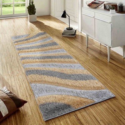 Modern Soft Waves Shimmer Shaggy Area Rugs Ochre 60X220 Cm from B&Q