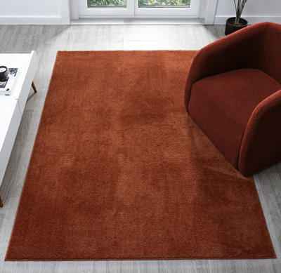 Comfy Washable Low Pile Living Room Area RugAnti-Slip Felt Backing Terracotta 80Cm X 120Cm from B&Q