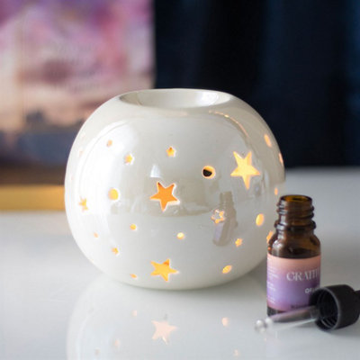Something Different White Iridescent Star Oil Burner And Wax Warmer from B&Q
