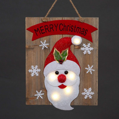 B&Q -  Christmas Home Decoration Battery Operated Novelty Santa Wooden Frame Wall Decoration With 6 Small Warm White Bulbs