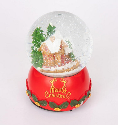 Shatchi Musical Christmas Snowglobe Large Water Ball Features Christmas Village Scene Resin Base Reads Merry Christmas- 10X15Cm from B&Q