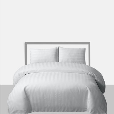 Neel Blue Cotton Double Duvet Cover & 2 Matching Pillow CasesWhite from B&Q