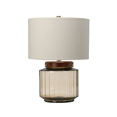 Elegant Ivory Shade Table Lamp With Aged Brass Metalwork And Dark Stained Wood from B&Q