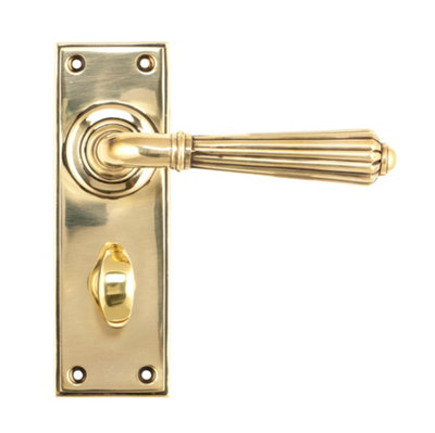 From The Anvil Aged Brass Hinton Lever Bathroom Set from B&Q