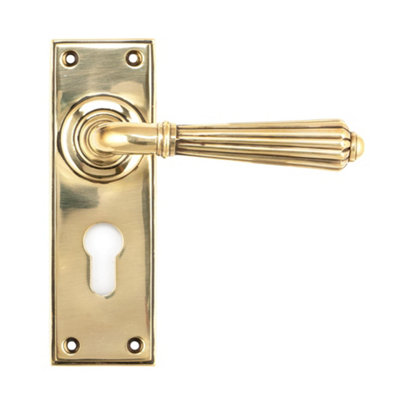 From The Anvil Aged Brass Hinton Lever Euro Lock Set from B&Q