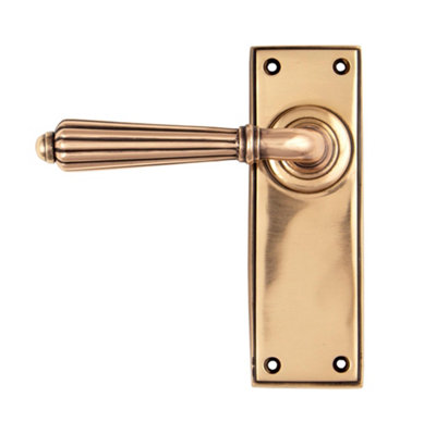 From The Anvil Polished Bronze Hinton Lever Latch Set from B&Q