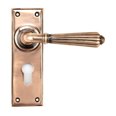 From The Anvil Polished Bronze Hinton Lever Euro Lock Set from B&Q